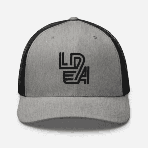 Gray and black retro trucker hat with LEDA logo embroidery.